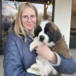 Portrait of Mia Collins and her dog